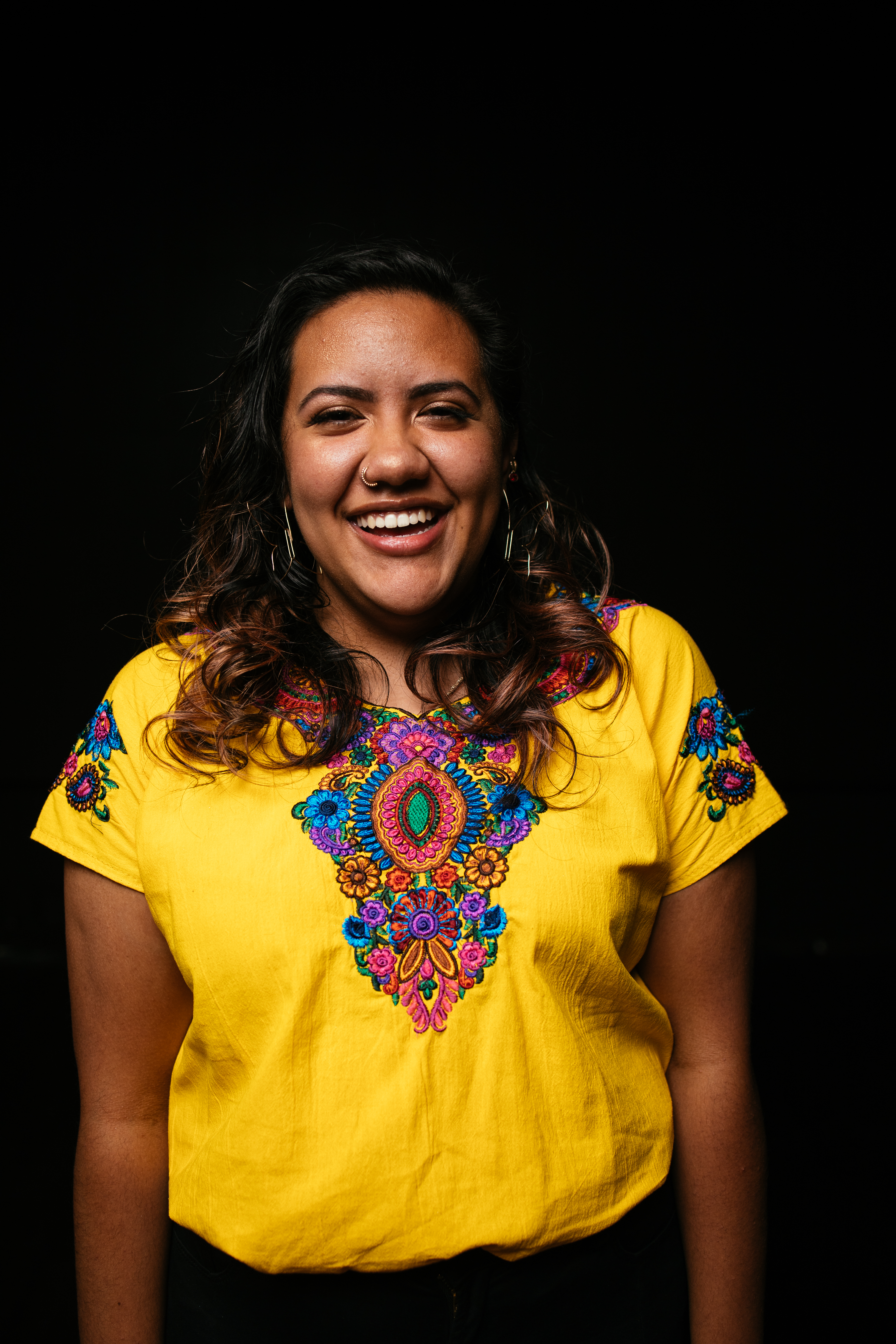 a profile picture of Maria Robles, a speaker at the conference.